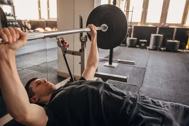 How Much Do You Have to Bench to Be Considered Strong? - Gunsmith Fitness