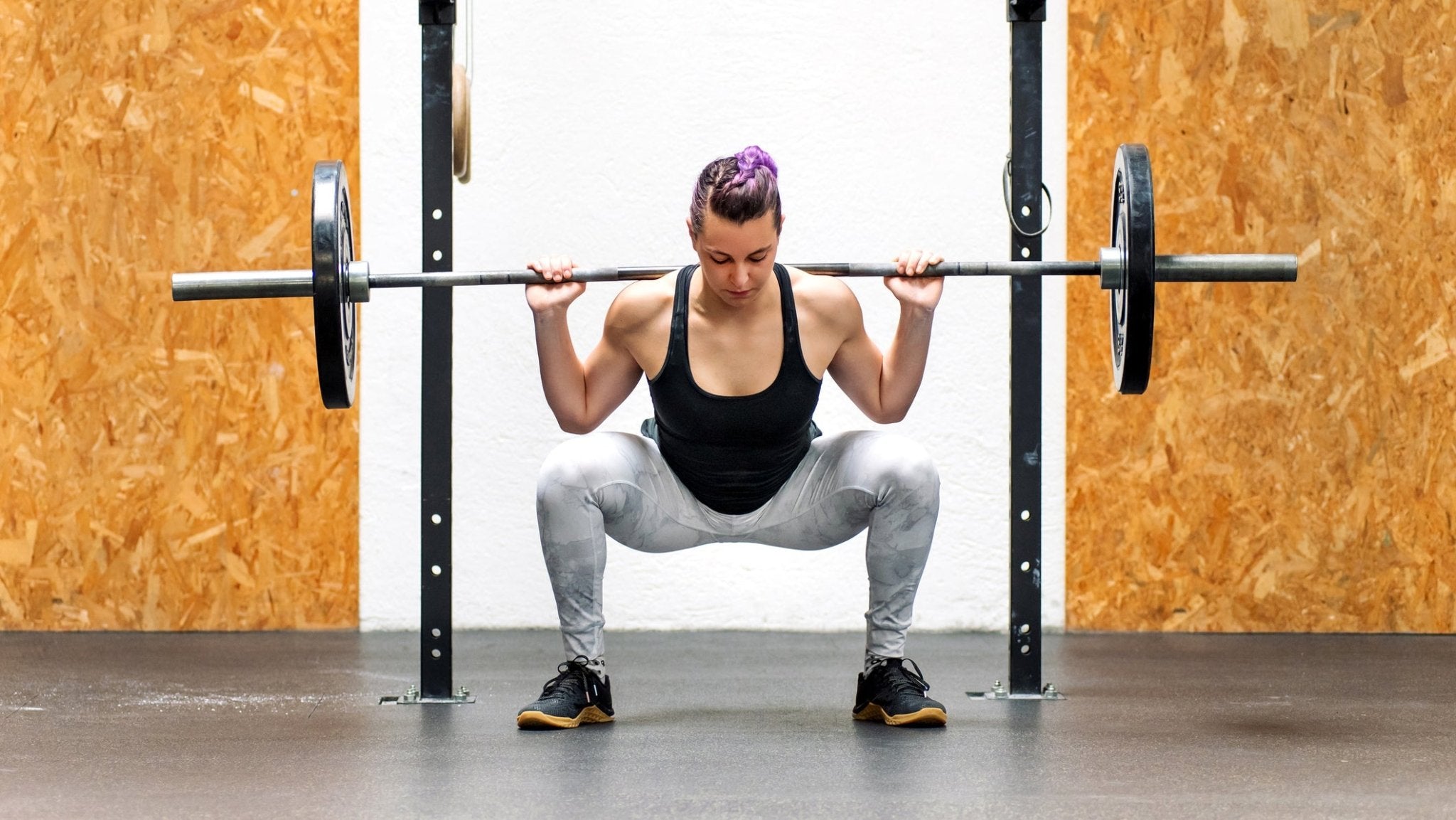 How to Wear a Weightlifting Belt When Performing a Back Squat