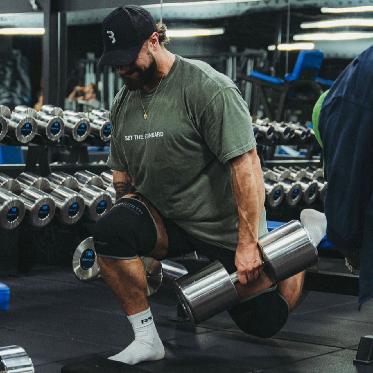 Athlete wearing the Extreme Gunsmith Fitness knee sleeves