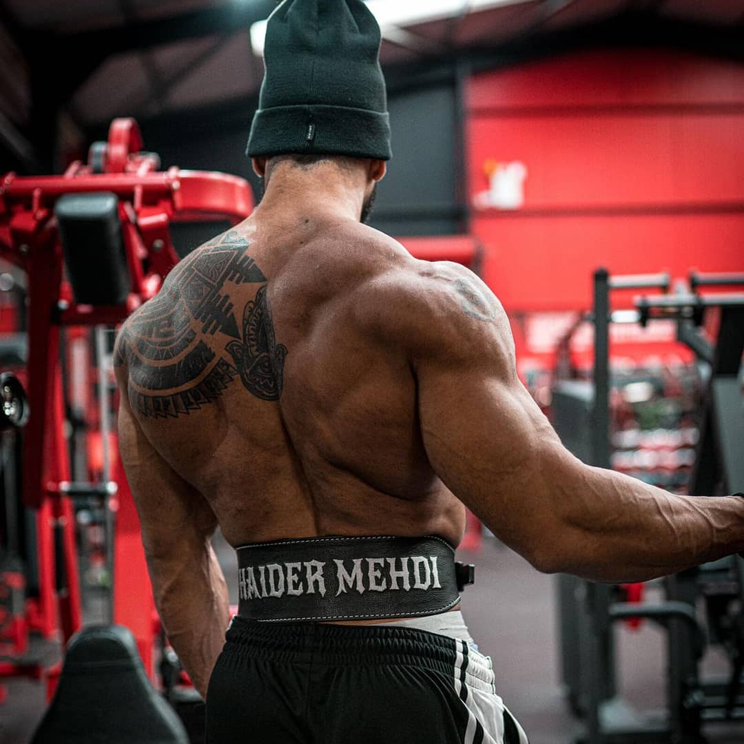 Athlete facing away from the camera wearing his bespoke olympic weightlifting belt