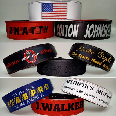 Custom belts stacked on top of each other.