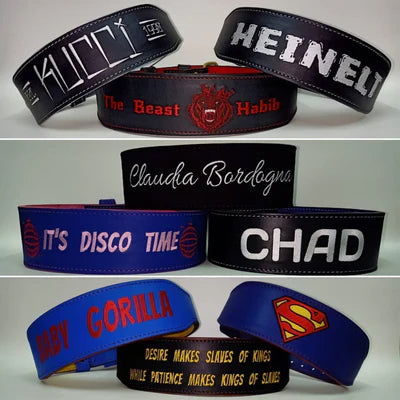 Custom belts stacked on top of each other.